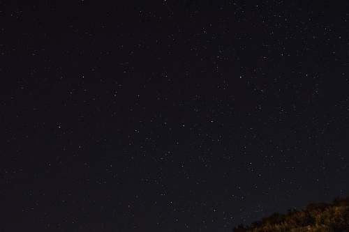 milky way green trees under starry sky stars